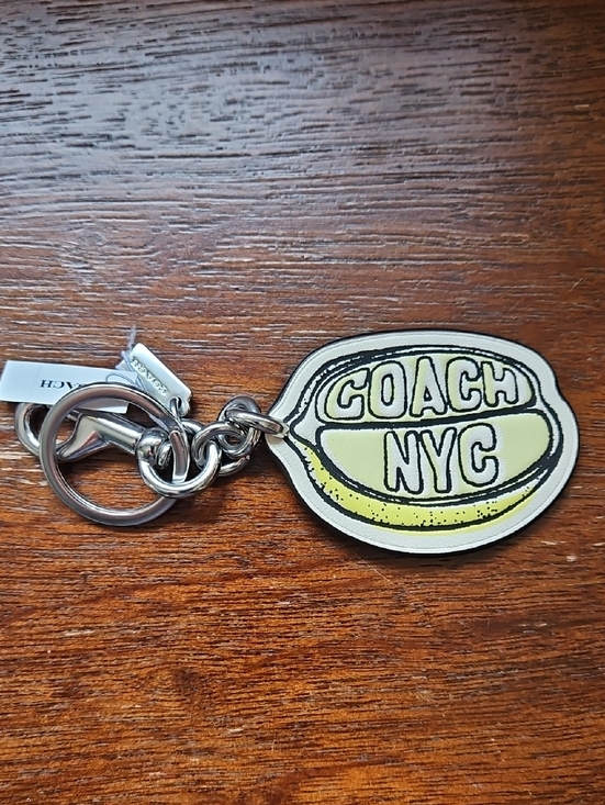 Coach Accessories - COACH LEMON BAG CHARM